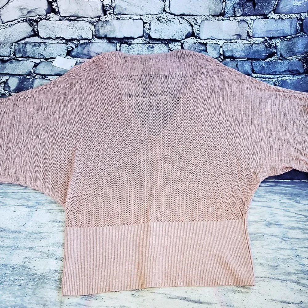 Jennifer Lopez pink peekaboo crochet silver thread kimono sleeves
